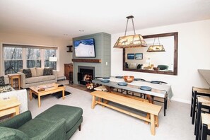 Smart TV, fireplace, books