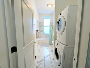 Hair dryer, towels, soap, shampoo