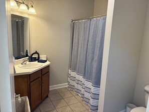 Hair dryer, towels, soap, toilet paper