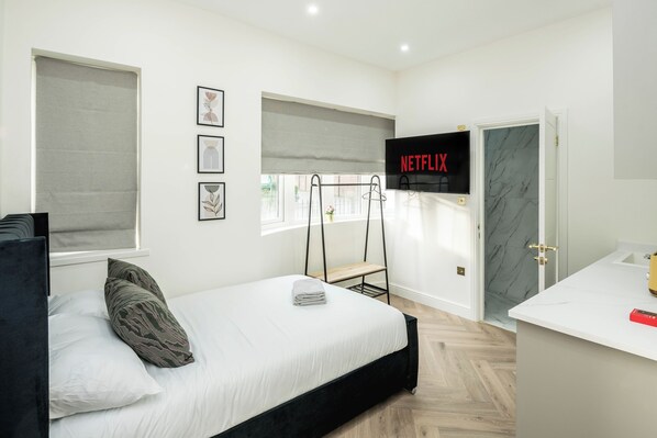 1 chambre, fer et planche à repasser, Wi-Fi, draps fournis