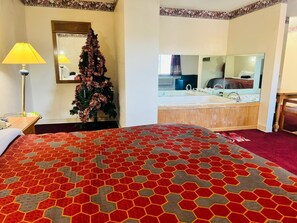 Room, 1 King Bed, Non Smoking, Jetted Tub | Desk, iron/ironing board, free WiFi, bed sheets - Villa Inn Motel Near Hwy 12 WI Capital O (Fort Atkinson)