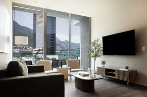 Apartment, Balcony, Mountain View | Living area | 32-inch Smart TV with digital channels - Modern Apts w Pool & Mountain View (Santa Catarina)