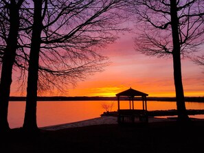 Property grounds - 3BR cottage on SE Lake Leelanau with private beach, marina and playground! (Traverse City)