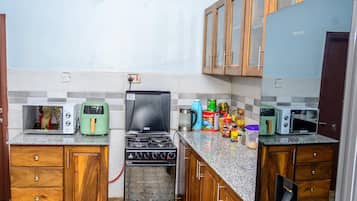 Mini-fridge, microwave, dining tables