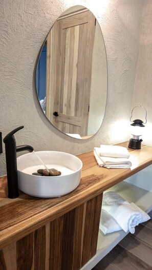 Separate bathtub and shower, towels