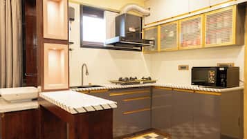 Presidential Suite, City View | Private kitchen | Fridge, microwave