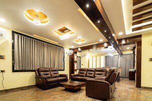 Presidential Suite, City View | Living area | 65-inch LED TV with satellite channels