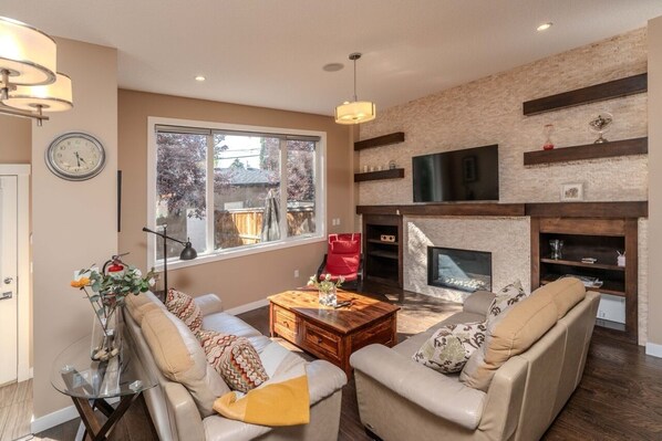 Smart TV, fireplace, books