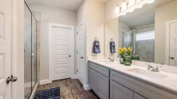 Shower, hair dryer, towels, soap