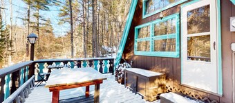 Charming gingerbread A-frame situated on 3 acres, woodstove, A/C, deck