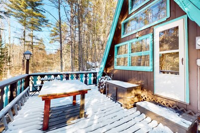 Charming gingerbread A-frame situated on 3 acres, woodstove, A/C, deck