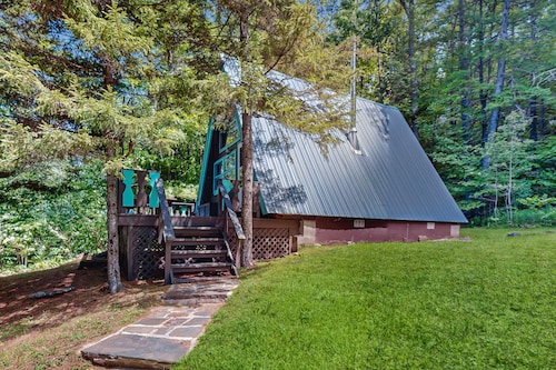 Charming gingerbread A-frame situated on 3 acres, woodstove, A/C, deck
