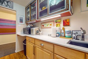 Fridge, microwave, coffee/tea maker, toaster
