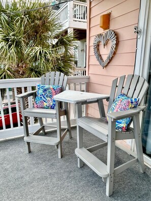 Outdoor dining - Charming first floor, 2-bedroom condo with ocean views and plenty of space! (Carolina Beach)