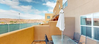 Spacious townhouse with shared heated pool, tennis courts, & balcony views