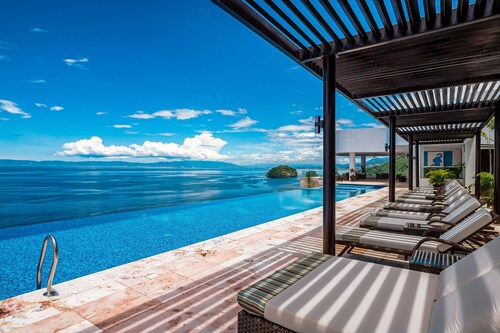 Stunning Oceanfront Apartment with Breathtaking Views and Luxurious Amenities