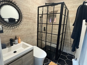Shower, hair dryer, towels, soap
