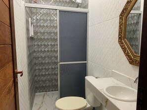 Quadruple Room, Multiple Beds | Bathroom | Shower, towels, soap, toilet paper