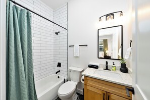 Hair dryer, towels, soap, toilet paper