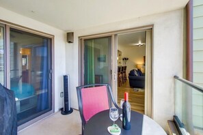 Condo, Multiple Beds, Balcony, City View | Outdoor dining