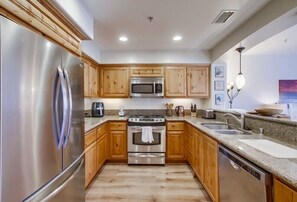 Condo, Multiple Beds, Balcony, City View | Private kitchen | Coffee/tea maker