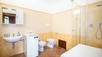 Shower, hair dryer, bidet, toilet paper