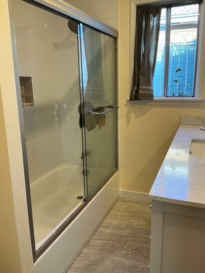 Jetted tub, hair dryer, towels, soap