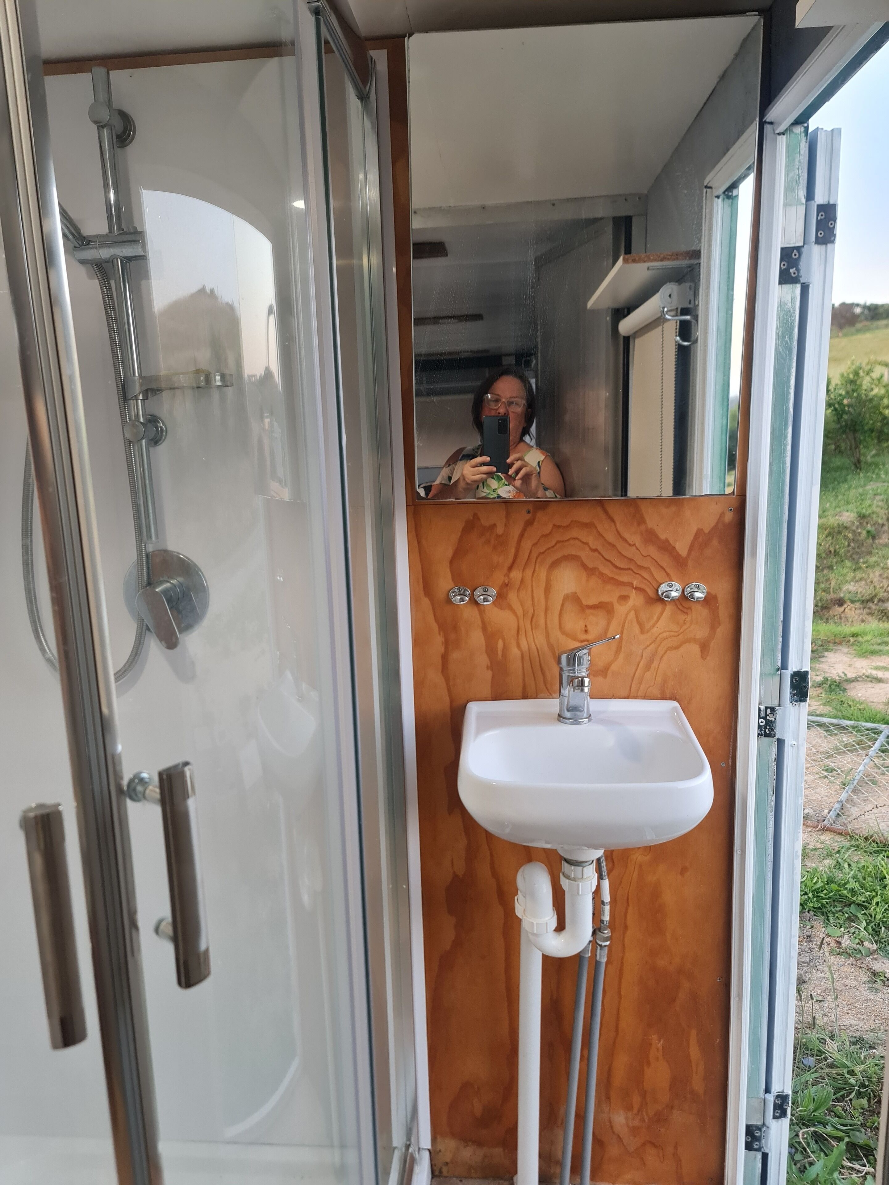 Shower, towels, soap, toilet paper