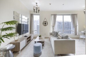 TV - Tranquil 1BR in Burj Views Tower B, Downtown by Deluxe Holiday Homes (Dubai)