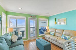 TV - Condo with breathtaking coastal views, relaxation, and adventure all in one place (Galveston)