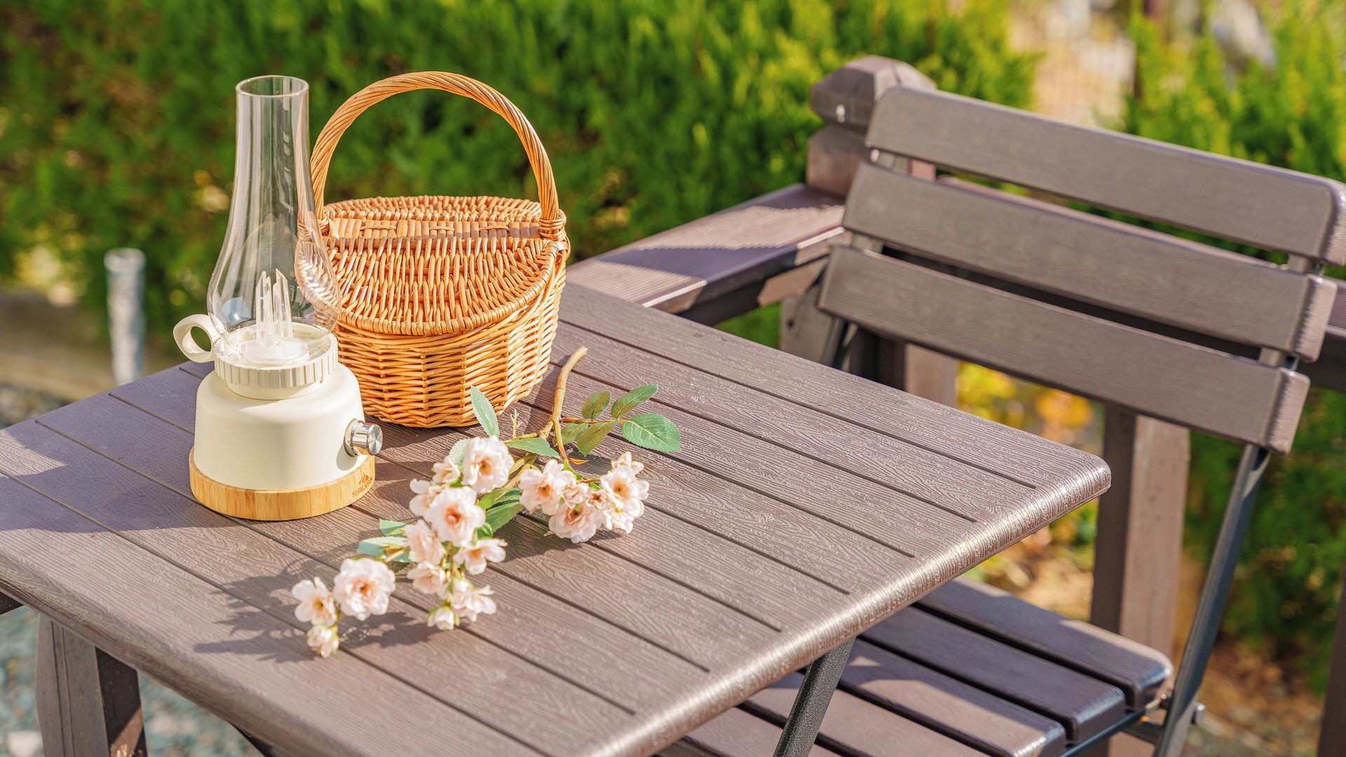 A wooden table with a wicker basket and a white object on it.