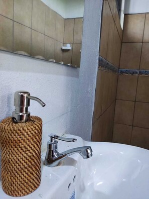 Shower, towels, soap, toilet paper