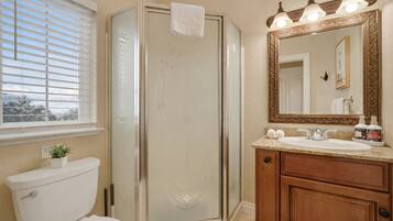 Shower, eco-friendly toiletries, hair dryer, towels