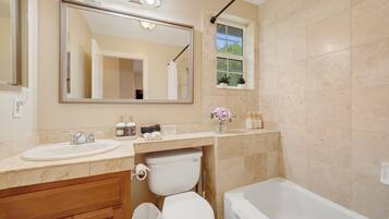 Shower, eco-friendly toiletries, hair dryer, towels