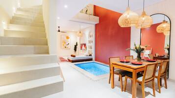 Deluxe Villa, Pool View | 2 bedrooms, in-room safe, desk, laptop workspace