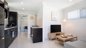 Superior-lejlighed - 1 queensize-seng - ikke-ryger - køkken | Opholdsområde