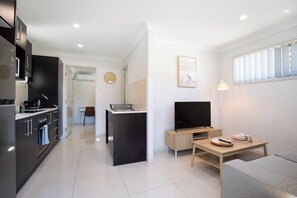 Departamento superior, 1 cama Queen size, para no fumadores, cocina | Área de sala de estar