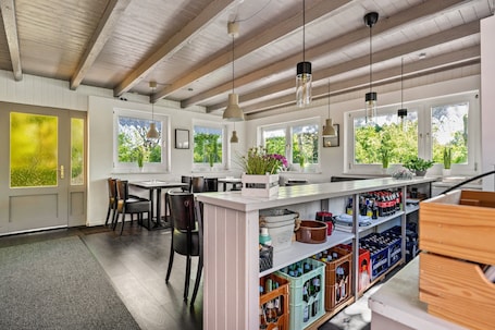 Dining. Tiny Home 'Vogelkoje' with Shared Terrace, Shared Garden and Wi-Fi
