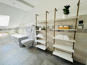 Shower, hair dryer, towels