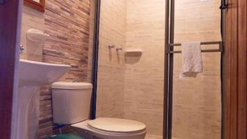 Shower, towels, soap, toilet paper
