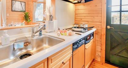 Private log house in Sano City with wood stove hammock board games and projector screen / Sano Tochigi