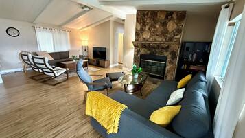 Smart TV, DVD player, foosball, books