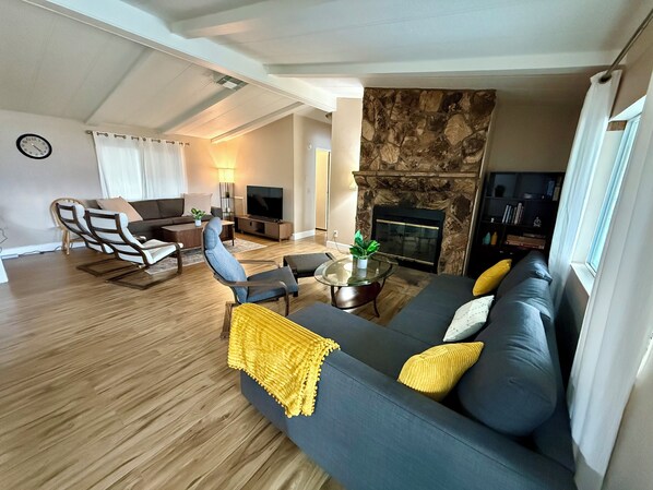 Smart TV, DVD player, foosball, books