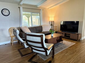 Smart TV, DVD player, foosball, books