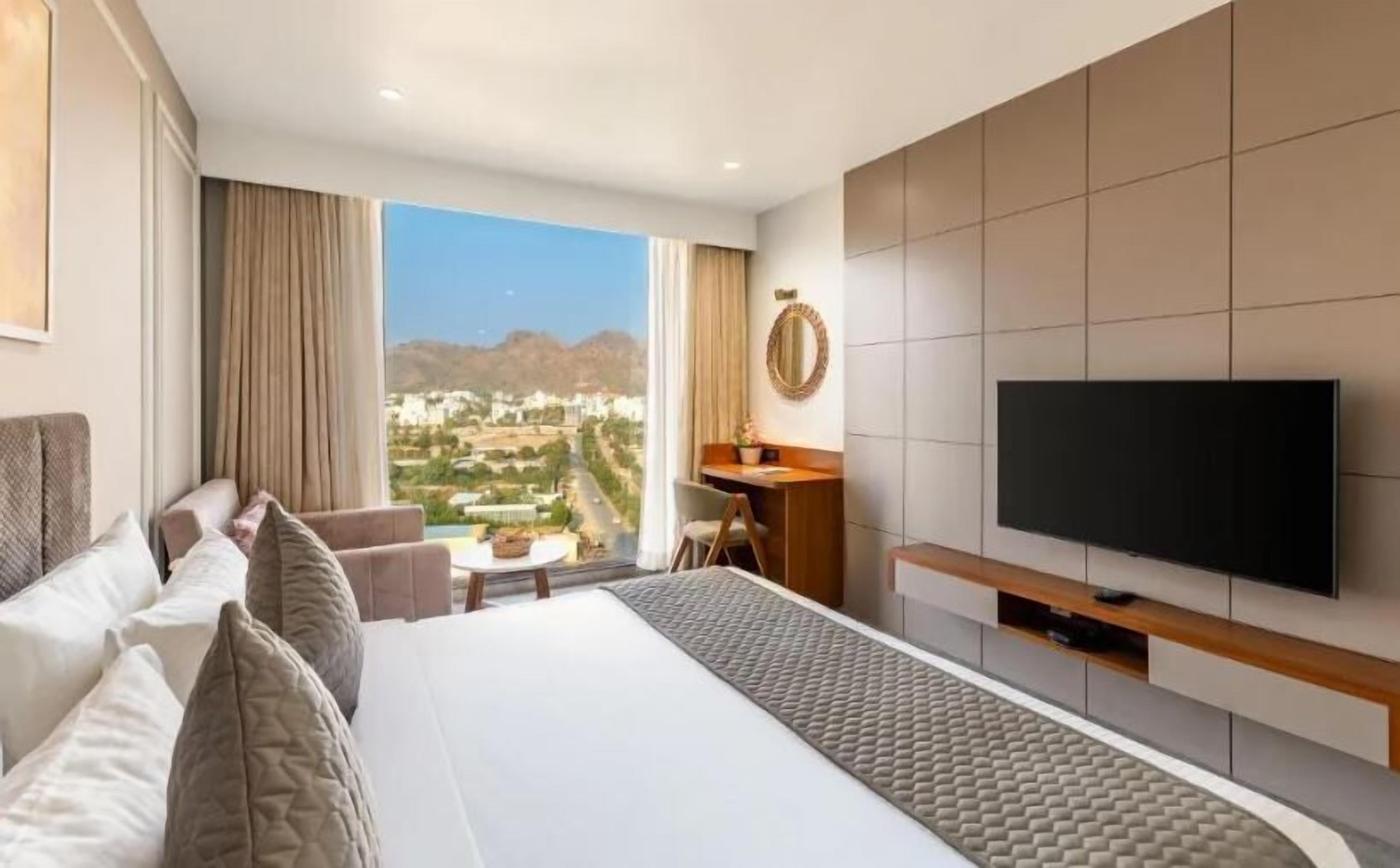 Premium bedding, memory foam beds, minibar, desk
