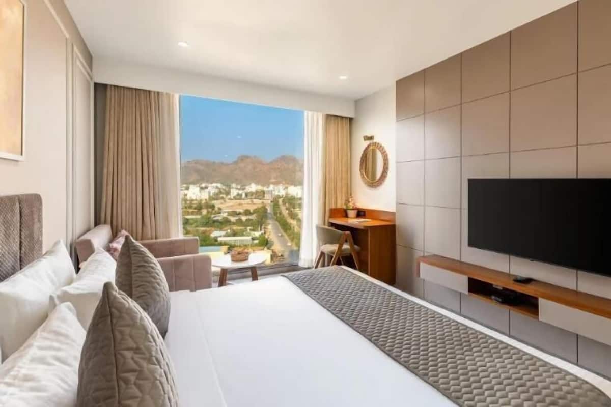 Premium bedding, memory foam beds, minibar, desk