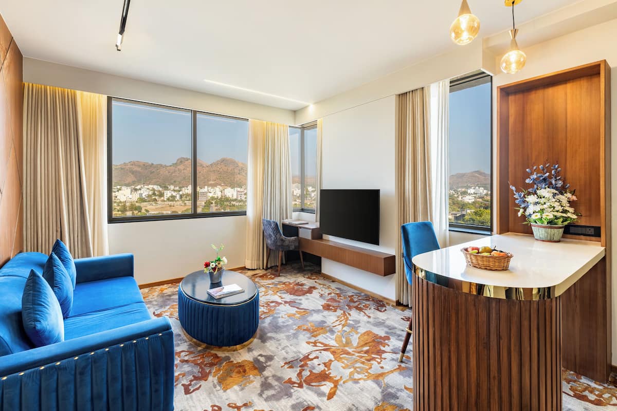 Luxe beddengoed, bedden met traagschuimmatras, een minibar, een bureau