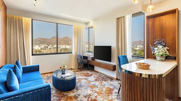 Premium bedding, memory foam beds, minibar, desk