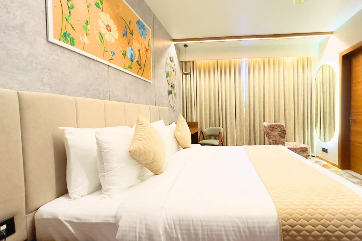 Premium bedding, memory-foam beds, minibar, desk