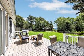 Outdoor dining - Scraggy Neck 5-Bed Retreat, Fenced Yard with Deck , Sleeps 10, Dog-Friendly, Grill, Community Boat Ramp & Playground, Scenic Loop for Walking and Biking, Perfect Vacation Getaway, 24 Hour Hospitality (Cataumet)